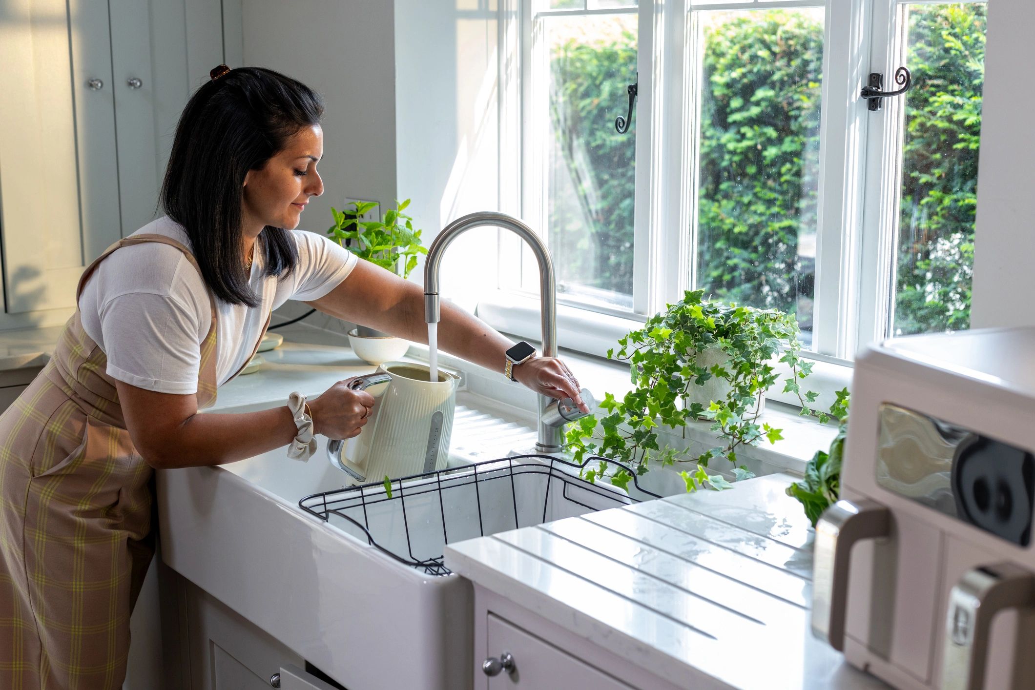 Kitchen sink and faucet in use